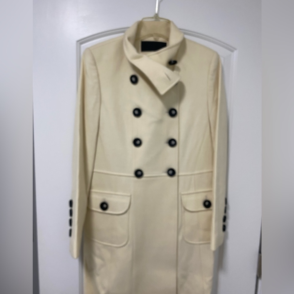 Woman coat size small ivory color with buttons on the front
